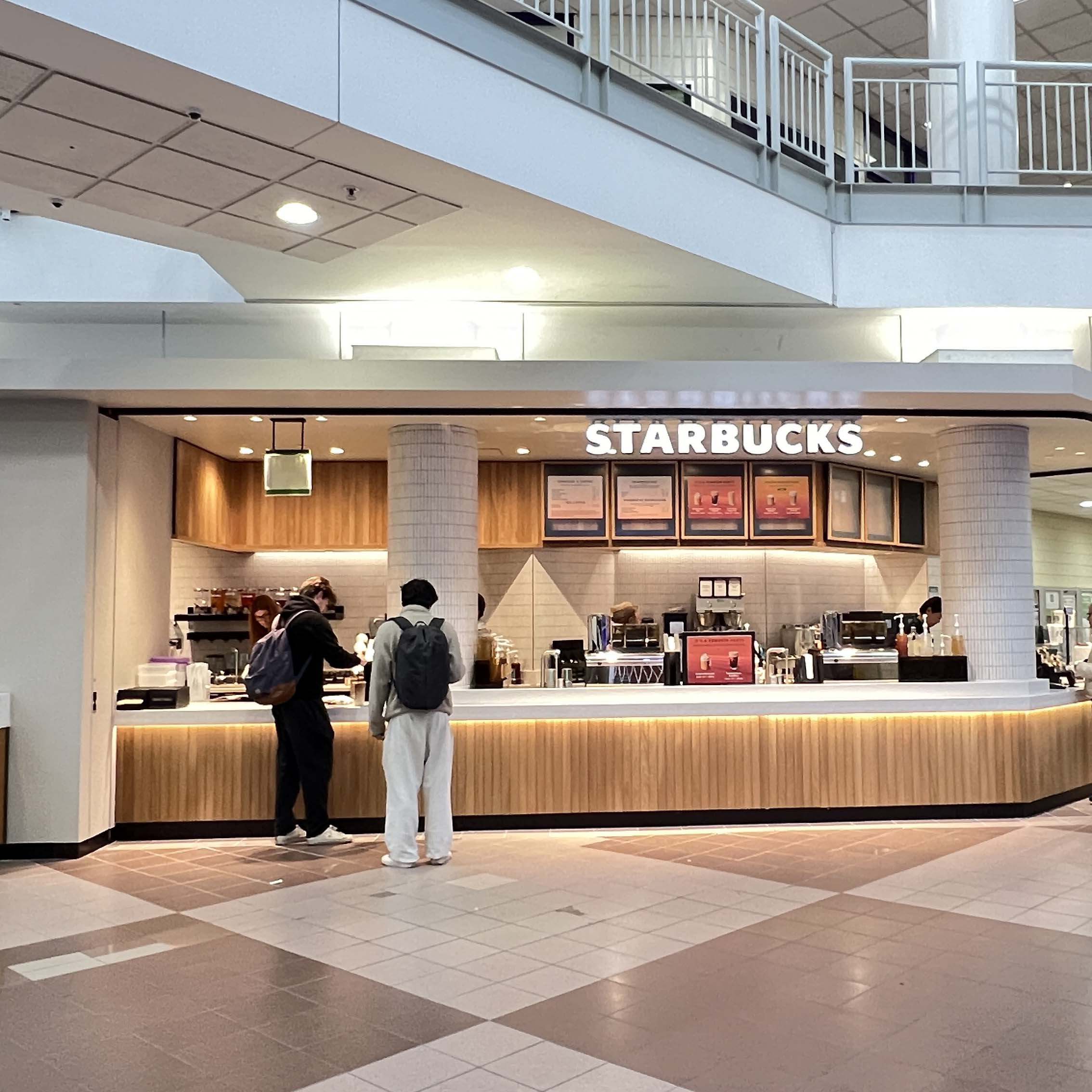 Two students ordering Starbucks.