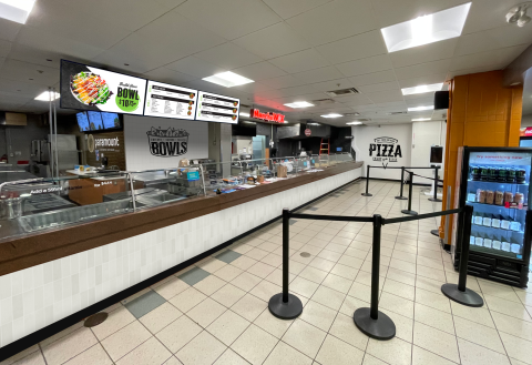 Wide shot of the Bowls and Pizza eateries.