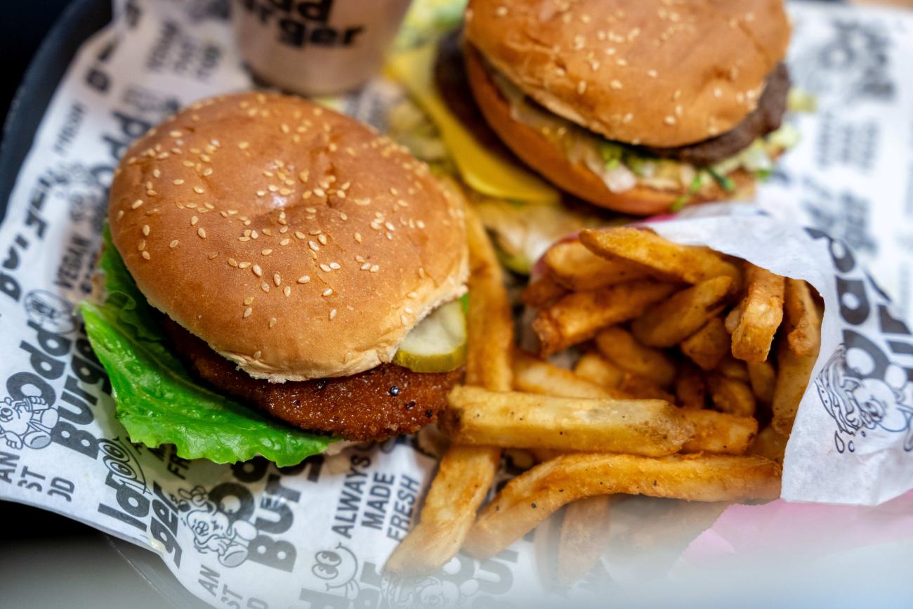 Two odd burgers, fries and milkshake