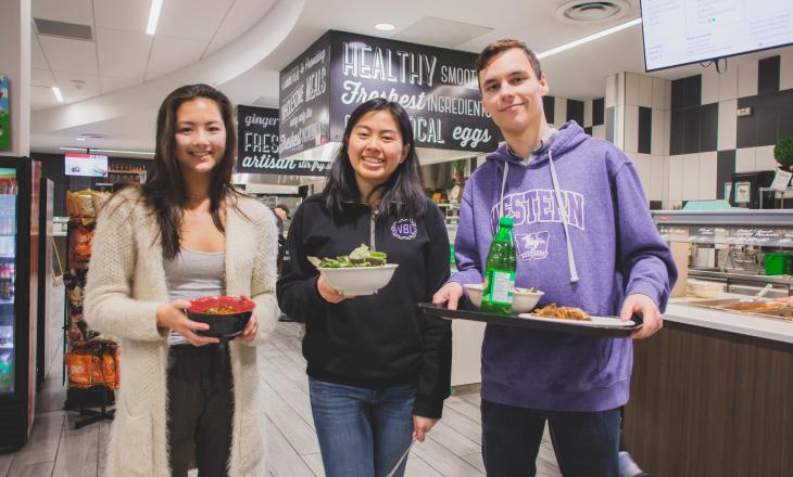 satisfied western students holding value pick meals