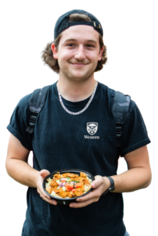Western Student holding a bowl of food